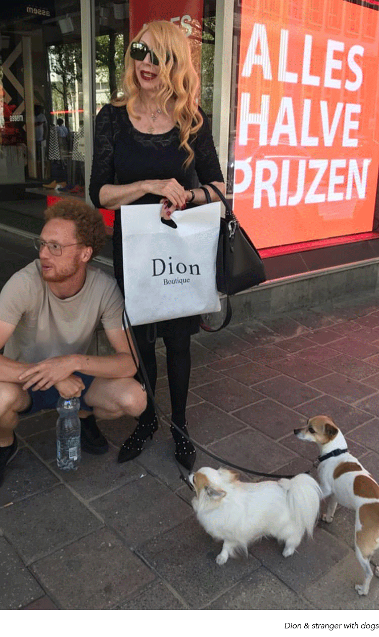Dion Soethoudt & stranger with dogs